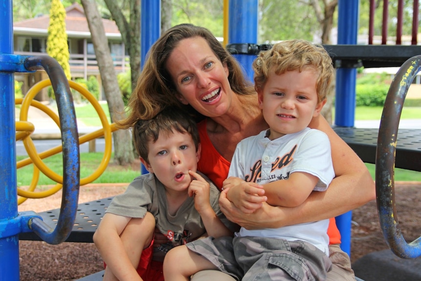 Summer Lockley in a Currumbin park with her two boys, five-year-old Jayden and three-year-old Timothy