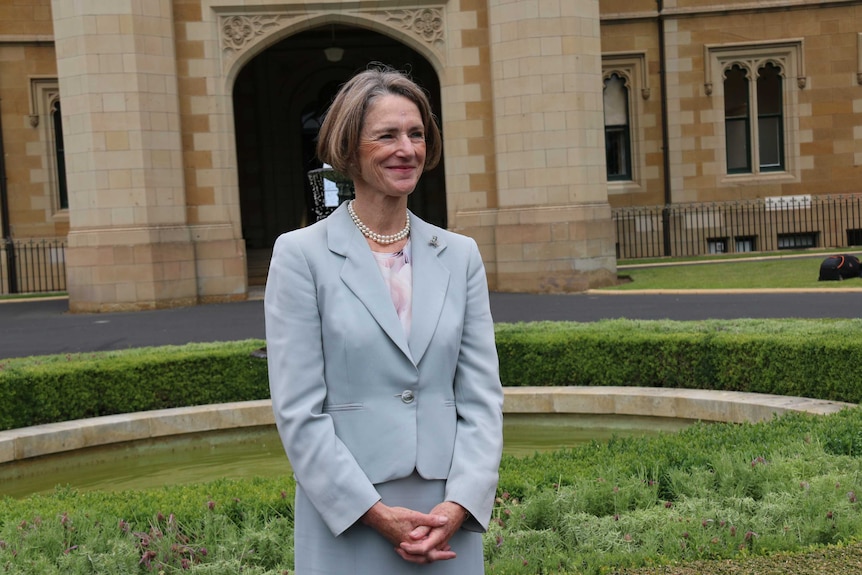 The 28th governor of Tasmania Kate Warner in front of Hobart's Government House