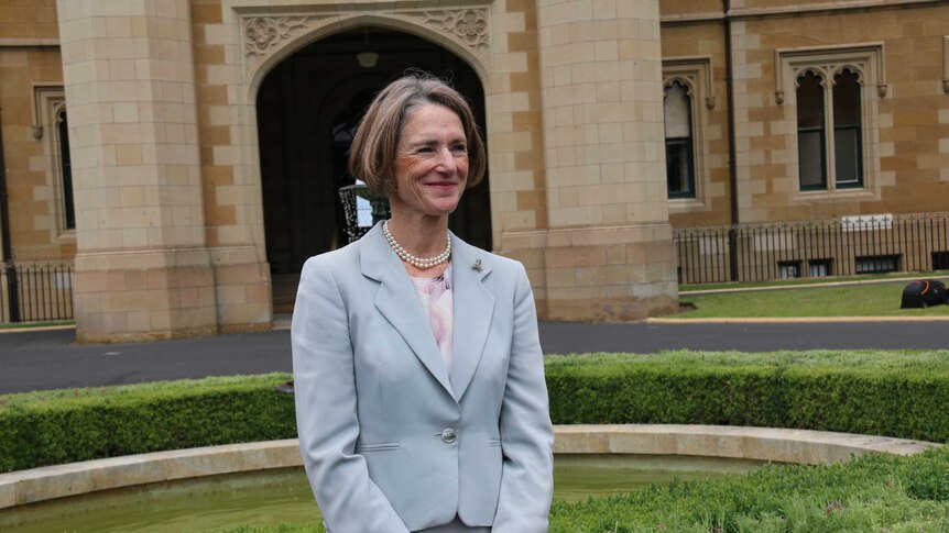 The 28th Governor of Tasmania Kate Warner in front of Hobart's Government House