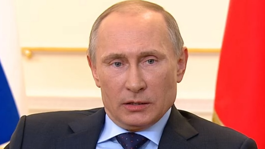 Russian president Vladimir Putin addresses the media