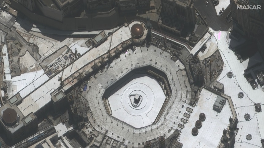 An empty Great Mosque in Mecca is seen by satellite, with no congregants around the Kaaba.