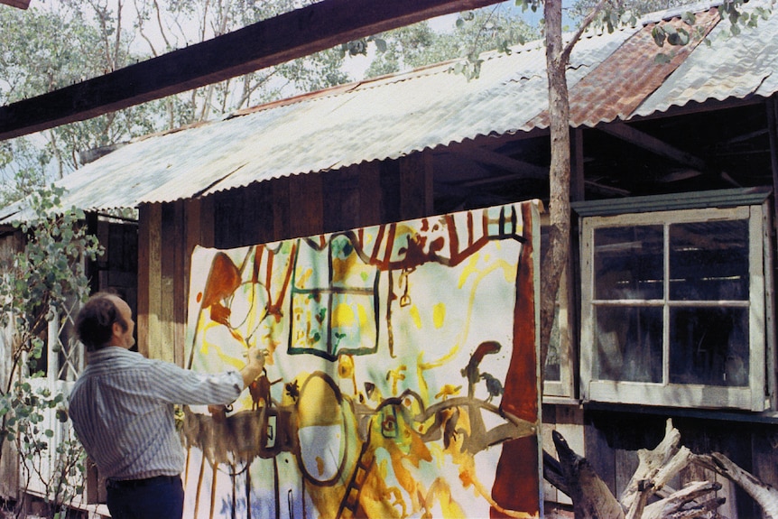 John Olsen paints outdoors