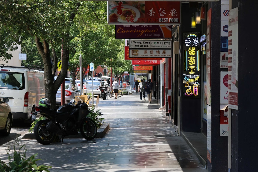 A street with many Chinese restaurants.
