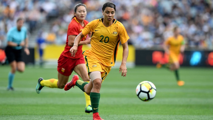 Sam Kerr of the Matildas chases the ball against China at Kardinia Park on November 26, 2017.