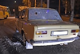 Car with bullet holes after fighting in Ukraine town of Mariupol breaks ceasefire