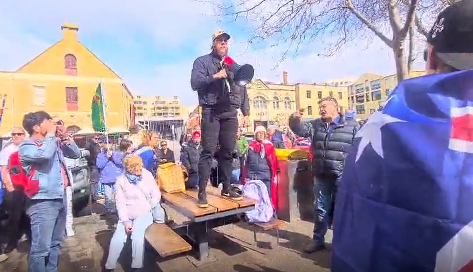 Neo-Nazi leader's words too extreme for many in March for Australia crowd