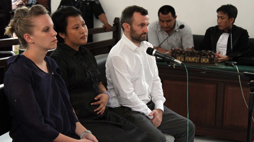 French journalists Valentine Bourrat and Thomas Dandois attend their trial in Jayapura