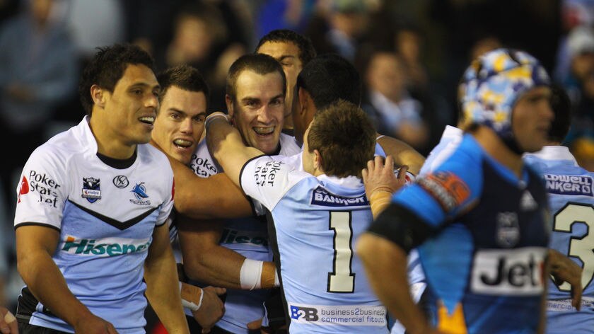 Fairytale ending...Luke Covell scored the opening try for Cronulla in his final home game.