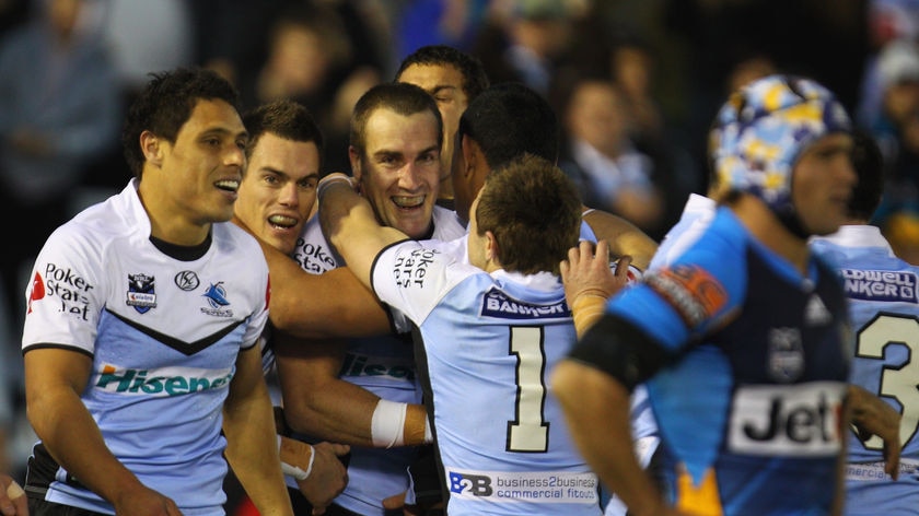 Fairytale ending...Luke Covell scored the opening try for Cronulla in his final home game.