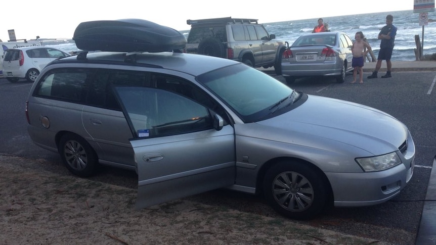 A car parked near a beach