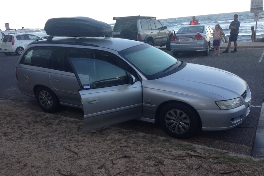 A car parked near a beach