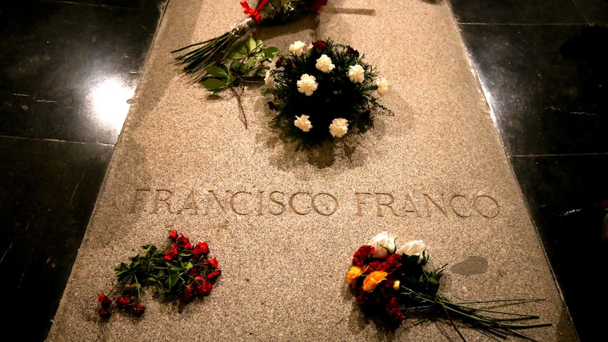 Flower are placed on the tomb of former Spanish dictator Francisco Franco