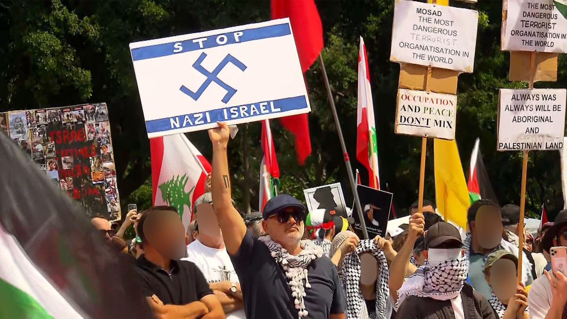 High-profile restaurateur pleads guilty to displaying Nazi symbol at pro-Palestinian rally in Sydney