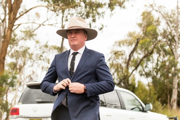 Barnaby Joyce buttons up his jacket ahead of a press conference in Armidale