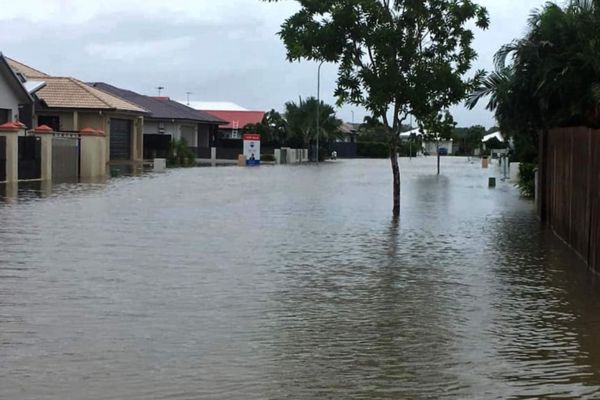 A street in Idalia, Townsville during the February floods, water more than 1m high covers the street