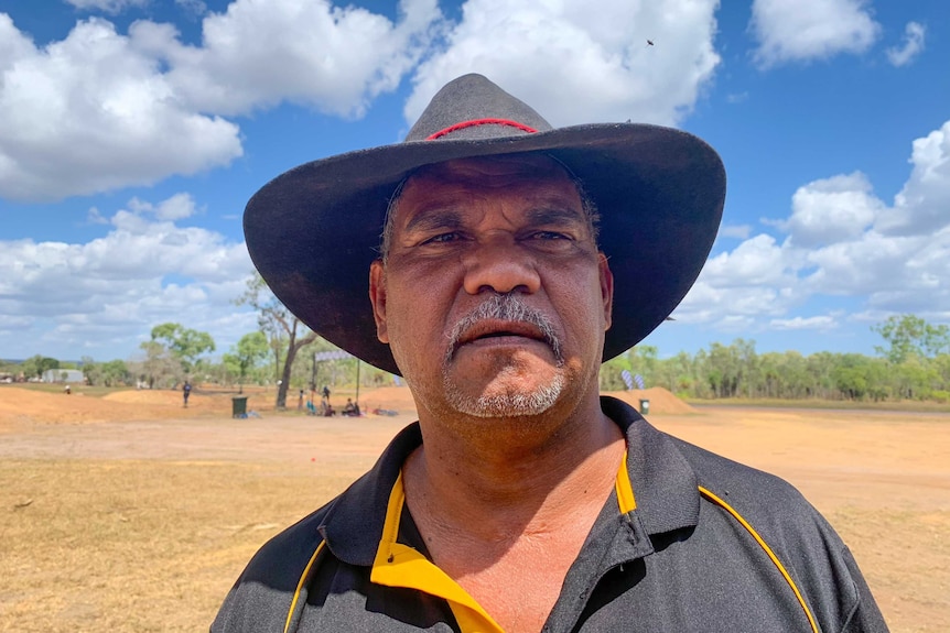 Mayor John Wilson wearing an akubra-style hat and a polo shirt looks concerned.