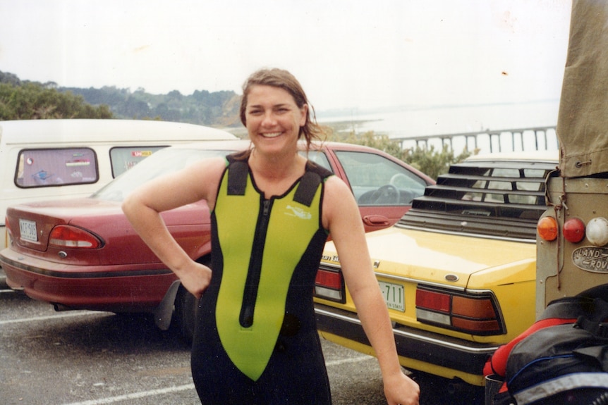 woman in scuba diving wetsuit