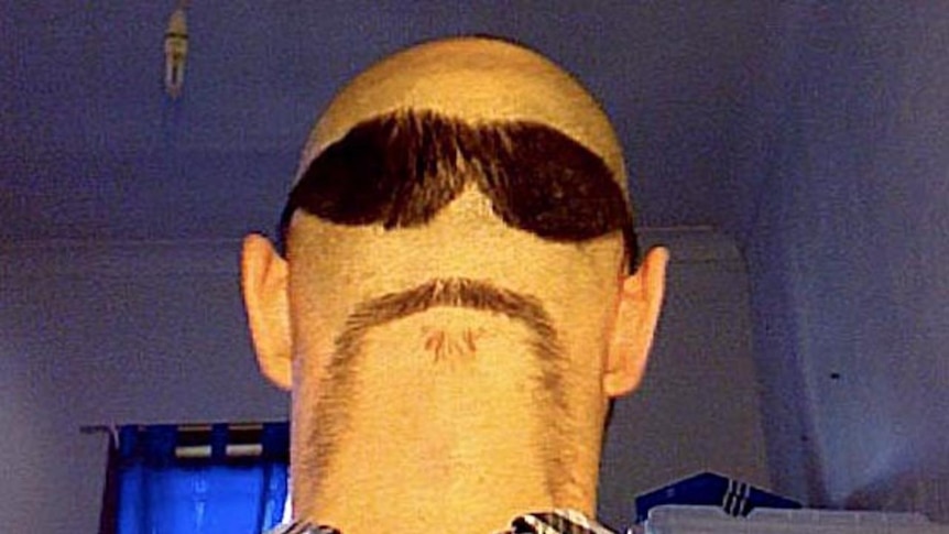 'Steve' grows a pair of sunglasses and a 'mo' on the back of his head for Movember