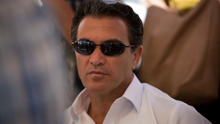 Yossi Cohen, then the director of Israel's Mossad intelligence agency, attends the funeral in Jerusalem
