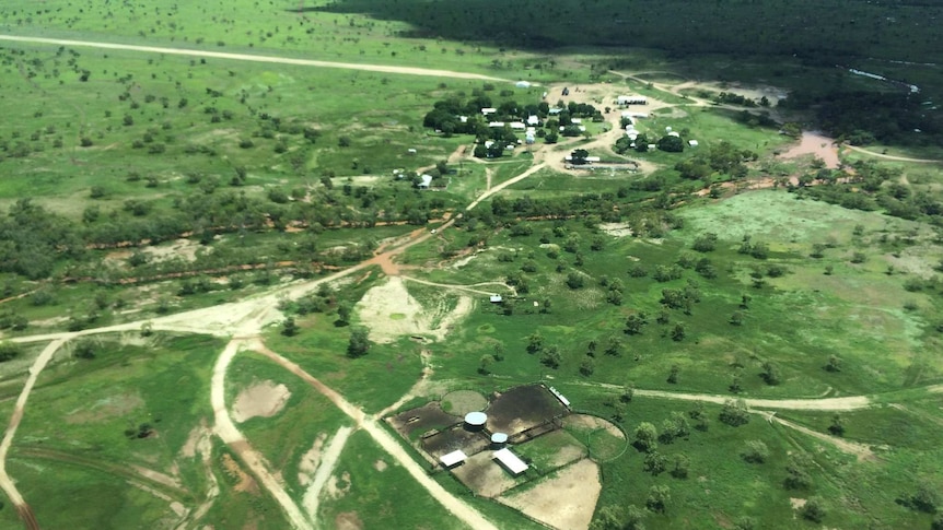 An aerial view taken from a plane of a very green Wave Hill Station