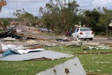 Building debris strewn across a street in Kalbarri, WA.