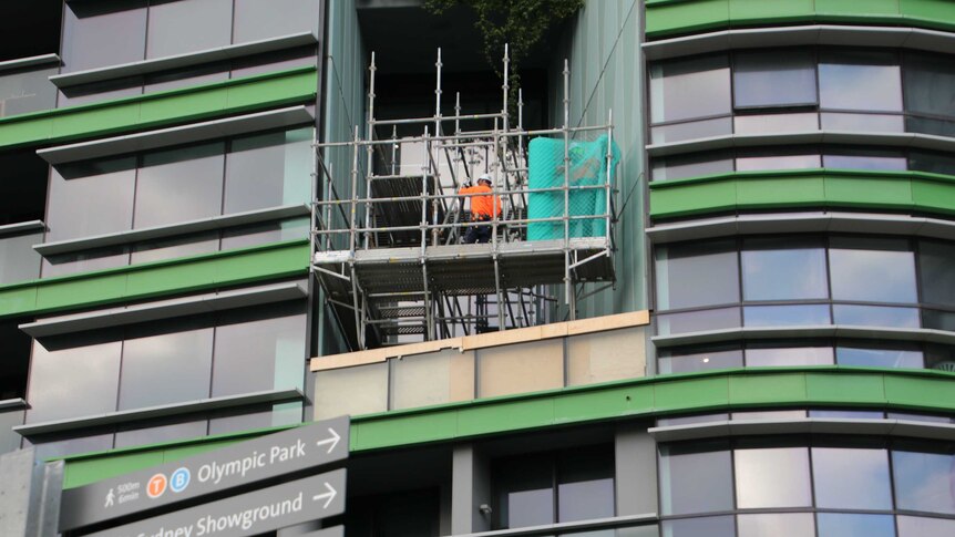 A construction worker at Opal Tower yesterday