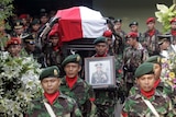 Suharto's coffin carried through Jakarta