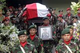 Suharto's coffin carried through Jakarta