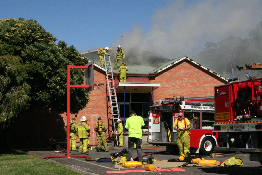 School rises from ashes but arsonist at large - ABC News