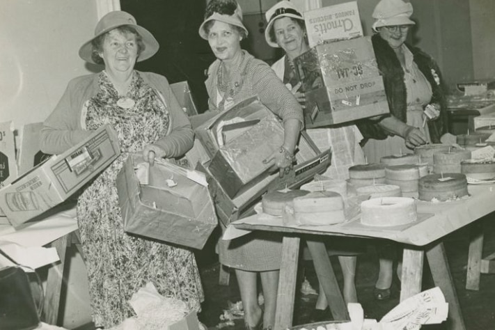 A black and white image of women