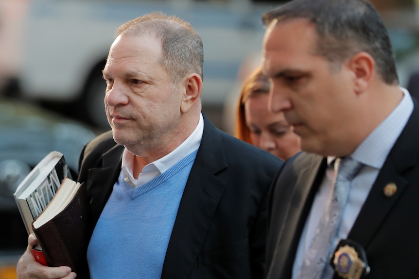 Film producer Harvey Weinstein arrives at the 1st Precinct in Manhattan.