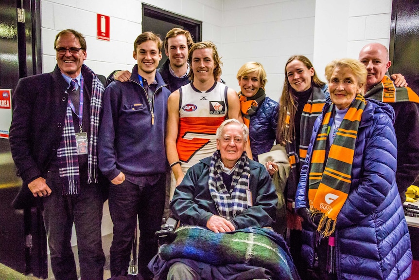 GWS Giants player Will Setterfield surrounded by family members