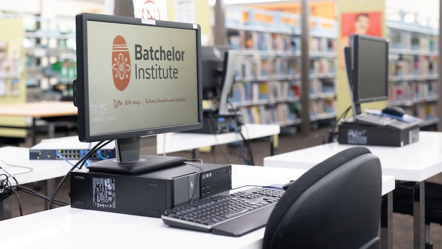 A computer and library at the Batchelor Institute.