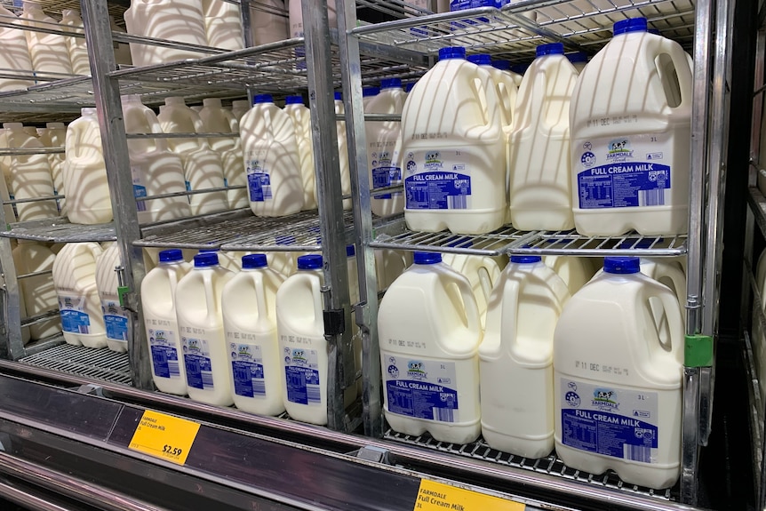 Plastic two and three litres bottle in the supermarket fridge.