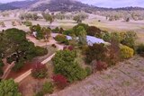 Drone footage of a colourful farm from the sky