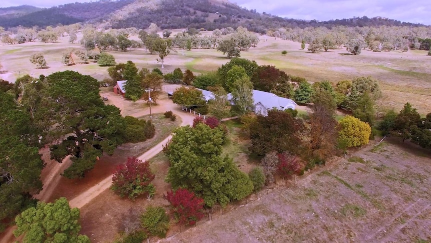 Drone footage of a colourful farm from the sky