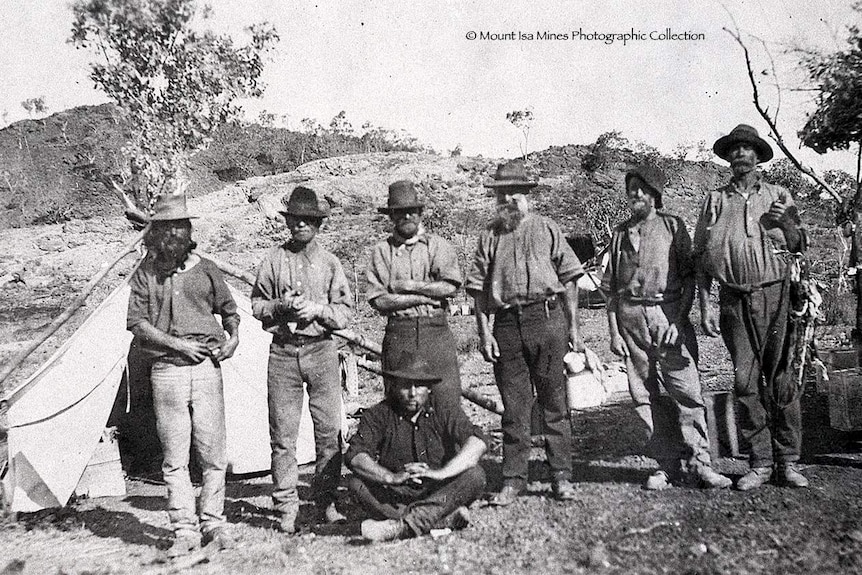 Black and white photo of mining prospectors in 1924 in their flannel clothing.