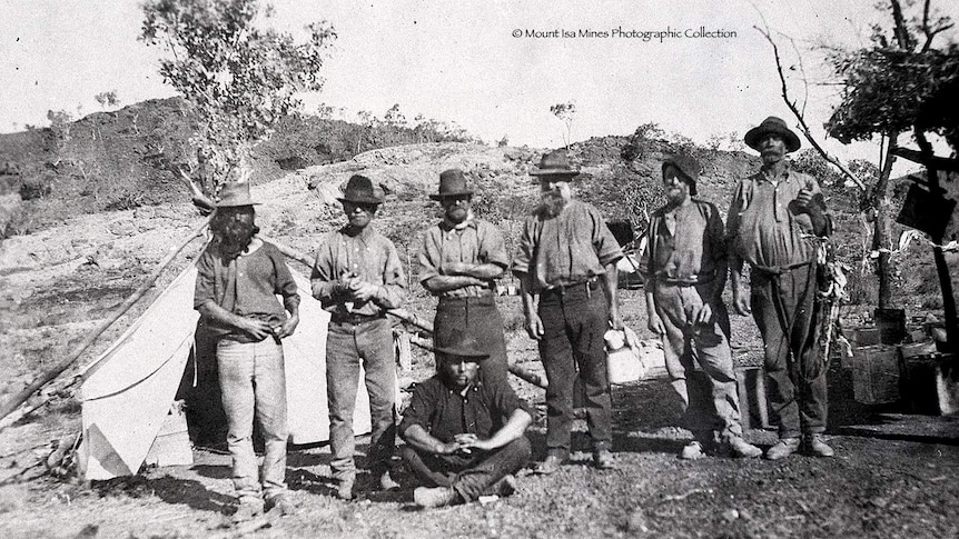 Black and white photo of mining prospectors in 1924 in their flannel clothing.