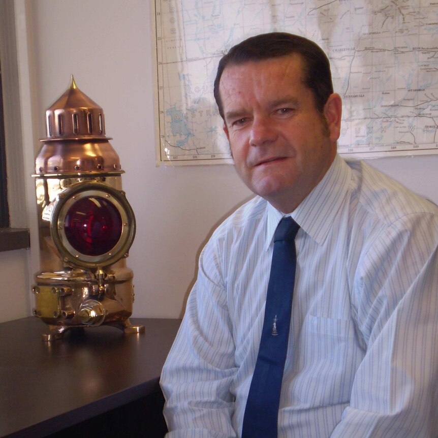 Executive Director of Operations at Maritime Safety Queensland Jim Huggett sitting down in an office