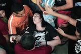 Migrant woman faints