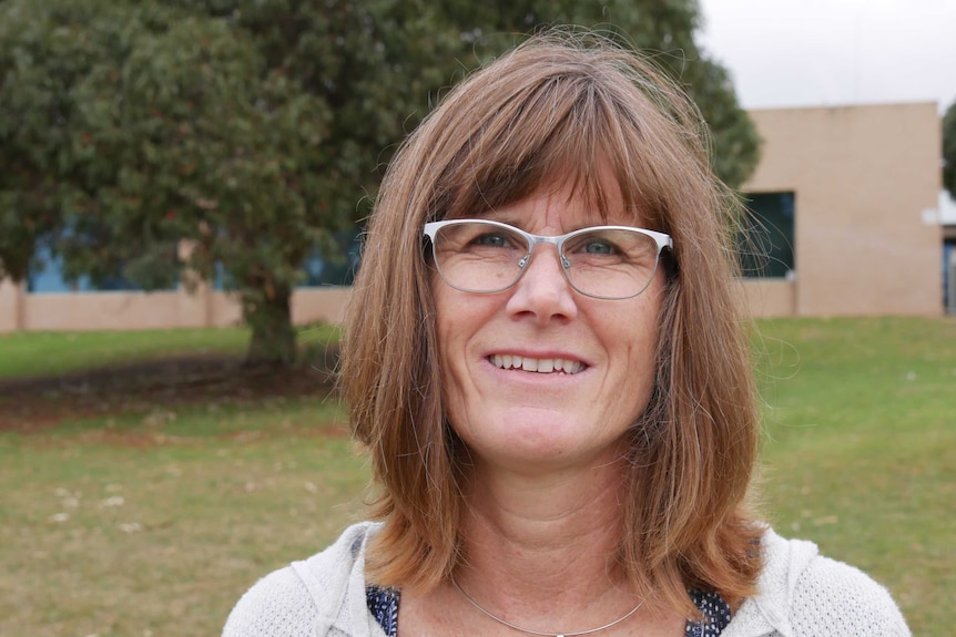 Esperance resident Michelle Crisp standing in front of grass and a tree.