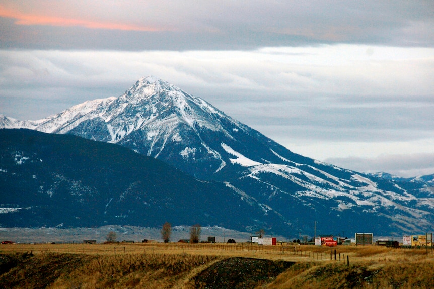 The mountains of Emigrant Peak are shown in the background behind Paradise Valley in Montana, US
