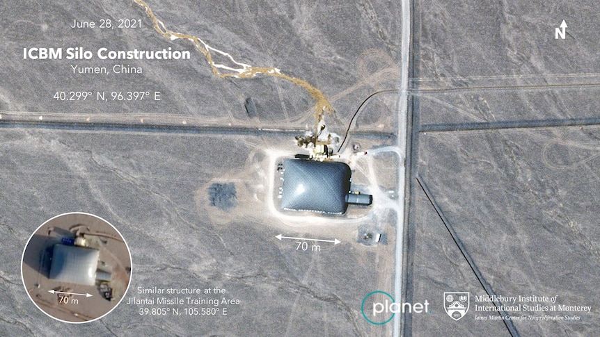 A satellite image of a silver missile silo 
