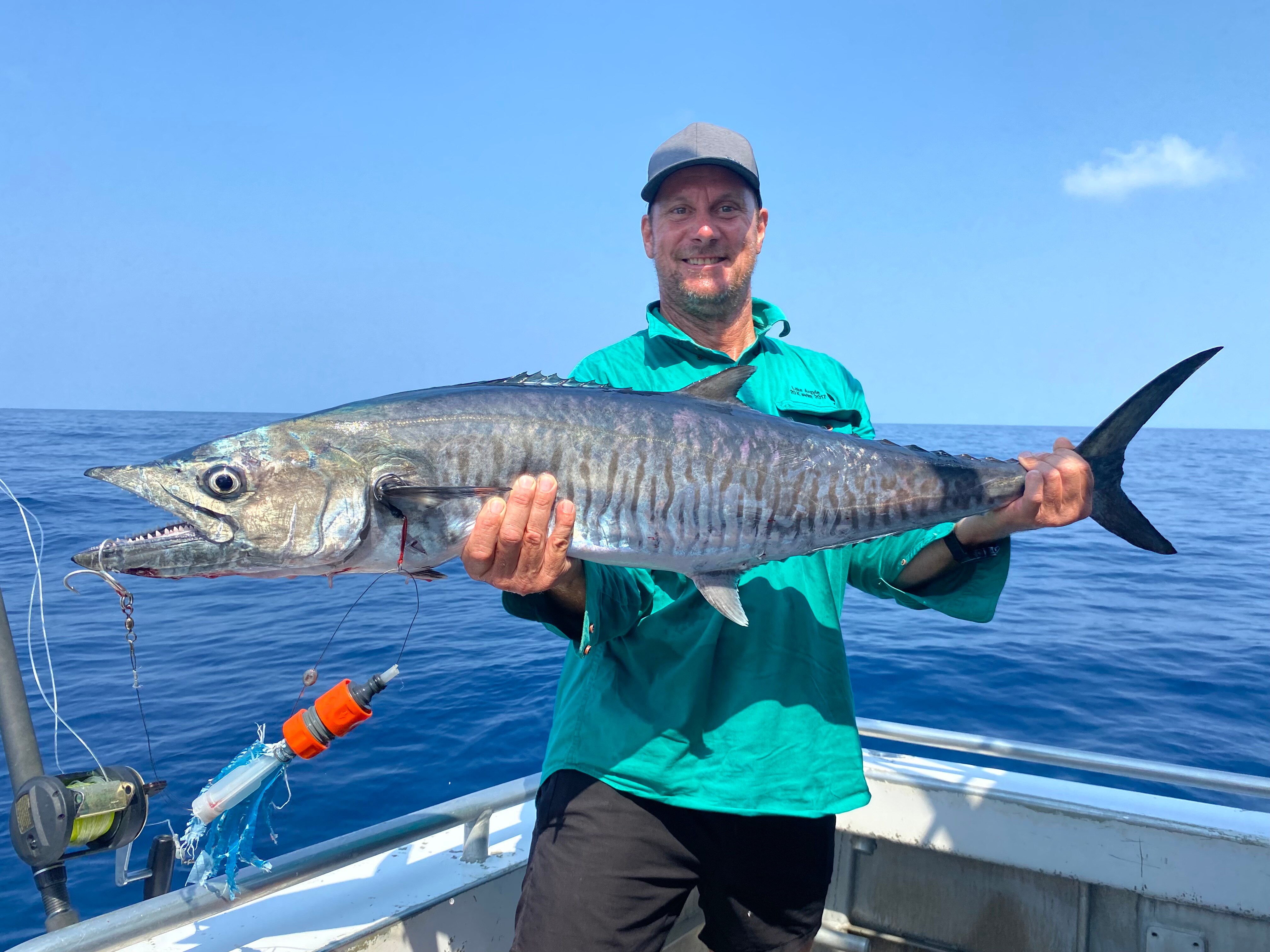 The hose fitting lure and the mackerel that ate it