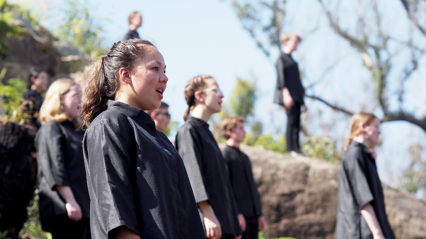 a children's choir sings in the aftermath of the NSW bushfires