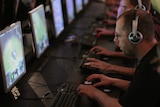 Gamers playing computer games