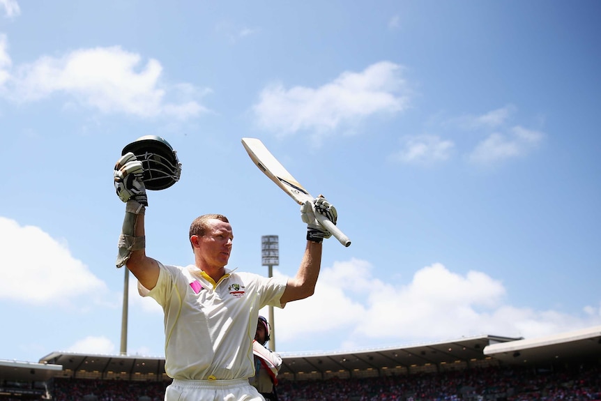 Chris Rogers walks off the SCG at lunch on day three unbeaten on 114