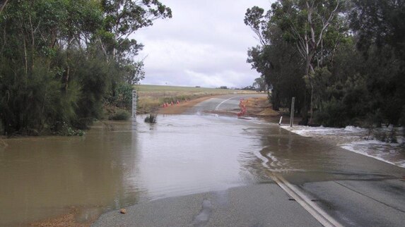 A photo of a section of road underwater on Chester Pass Road.