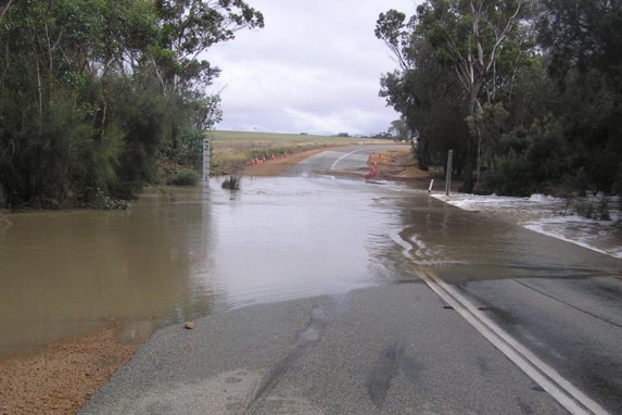 A photo of a section of road underwater on Chester Pass Road.