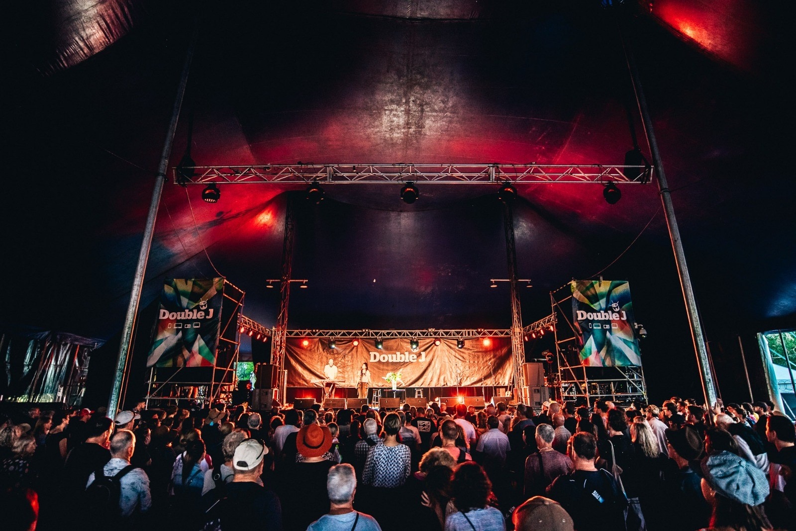 A picture of a stage at Bluesfest a large crowd in front